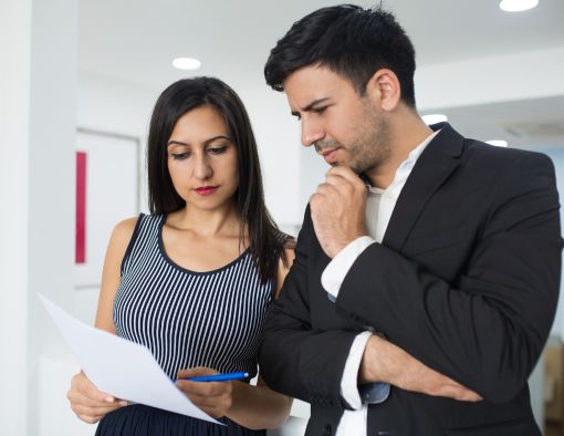 CPA reviewing deductible business expenses with IRS guidelines.