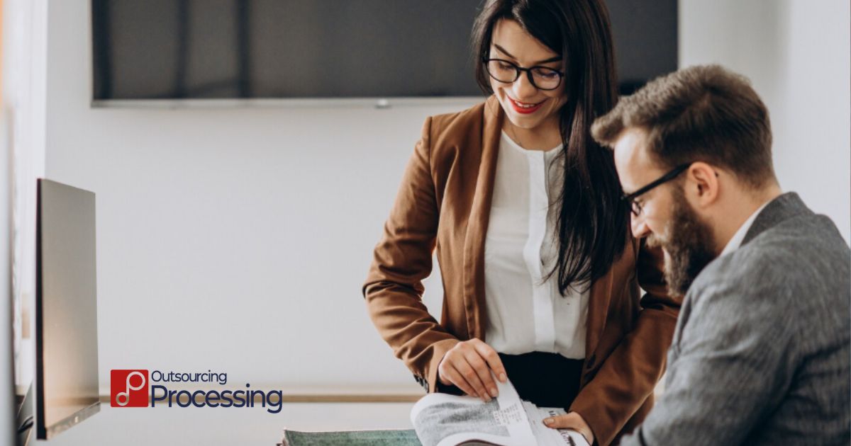 Business owner presenting financial statements to bank for business loan approval